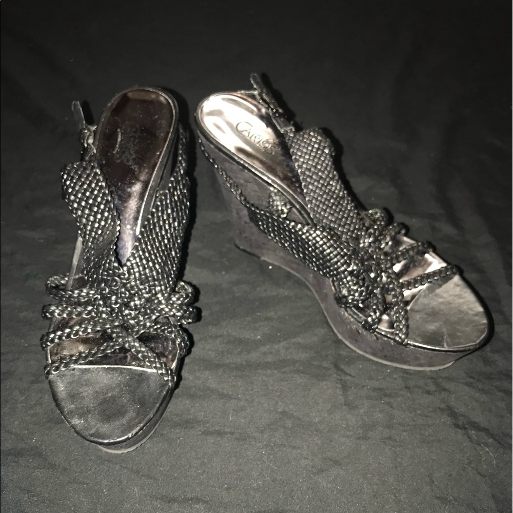 Carlos Santana Wedges